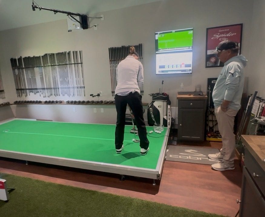 Sofie during a golf club fitting session with a launch monitor.